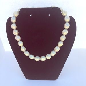 Pearl like silver tone necklace.